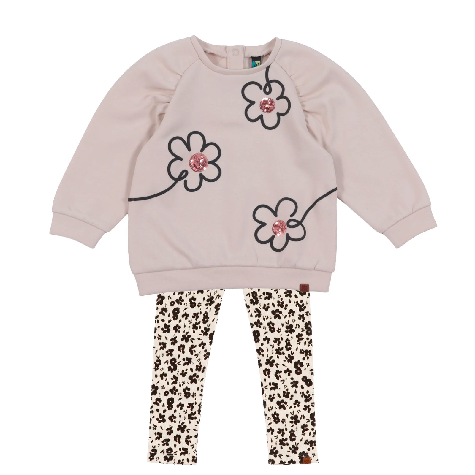 A children's two-piece outfit featuring a light pink sweatshirt with black outlined flower graphics and pink sequined flower centers, paired with cream leggings with a black floral  print pattern.