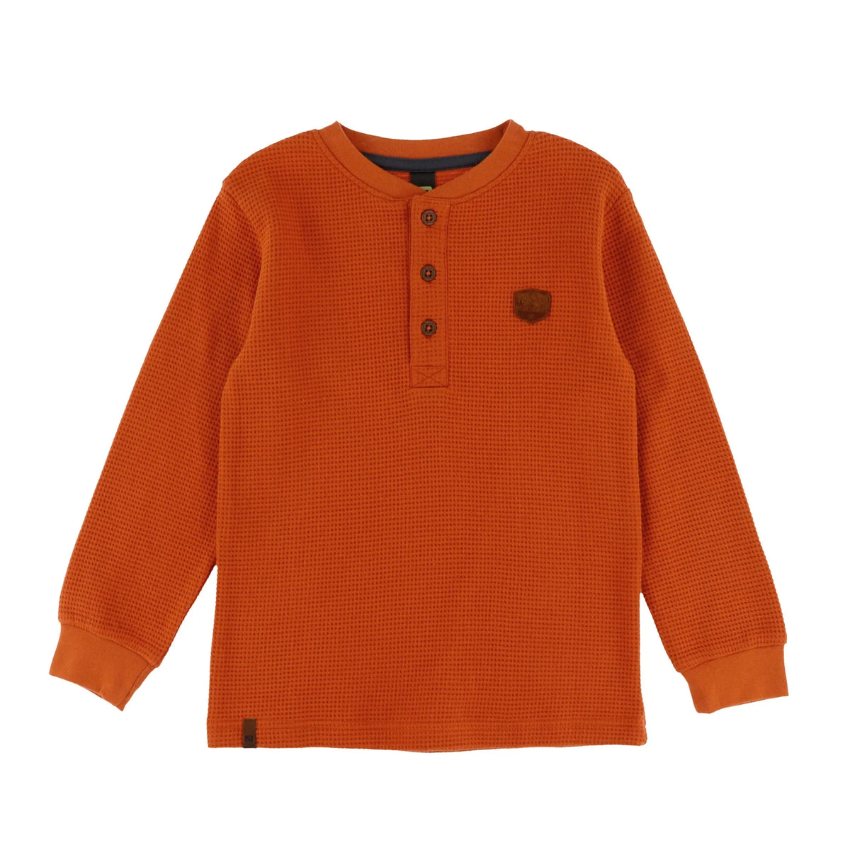 An orange waffle-knit long-sleeve henley shirt with three buttons on the chest and a small brown shield logo on the left chest, displayed flat against a white background.